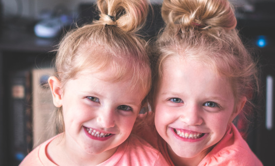 Image of two smiling children