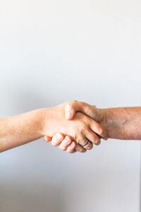 Two_people_shaking_hands