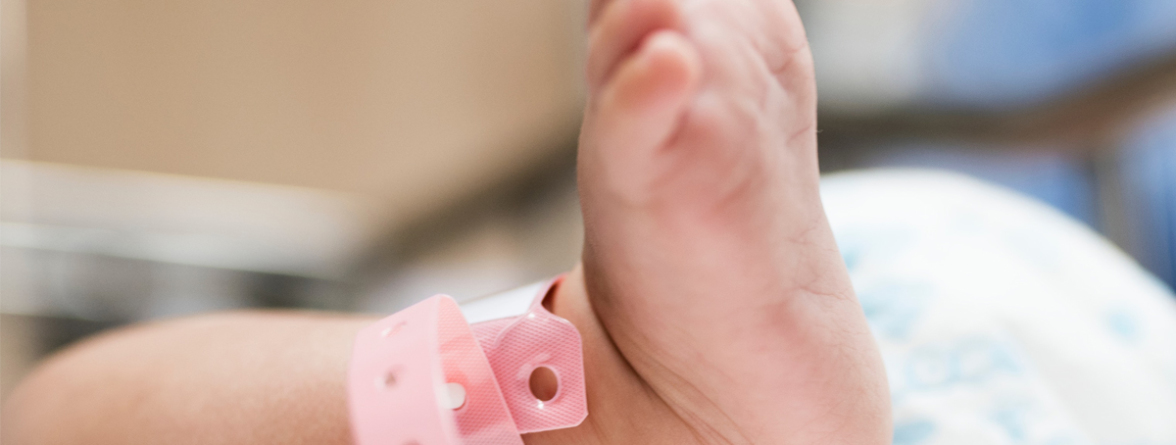 Picture of a baby's foot with a name tag