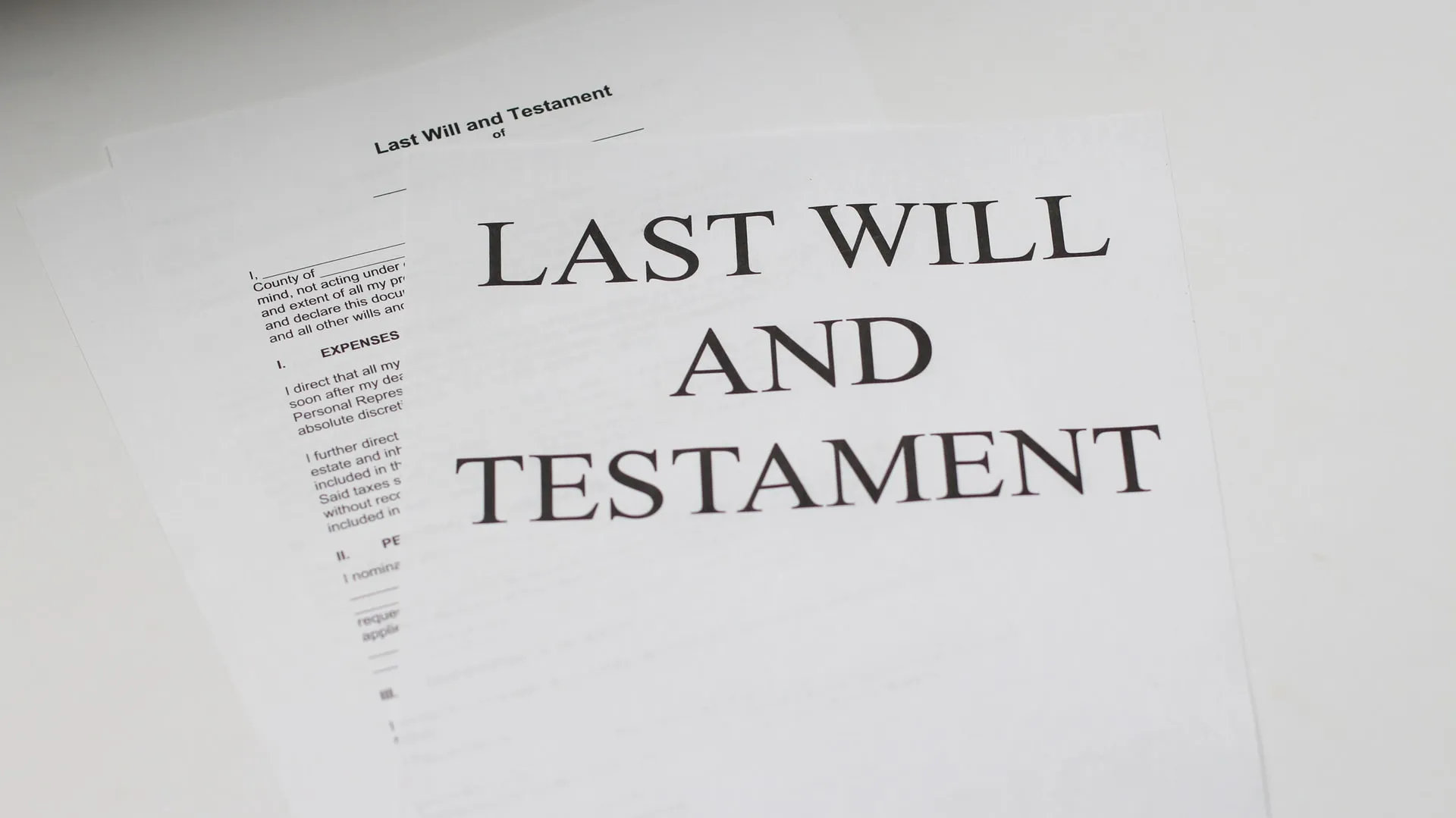 Two sheets of paper of the Last Will and Testament.